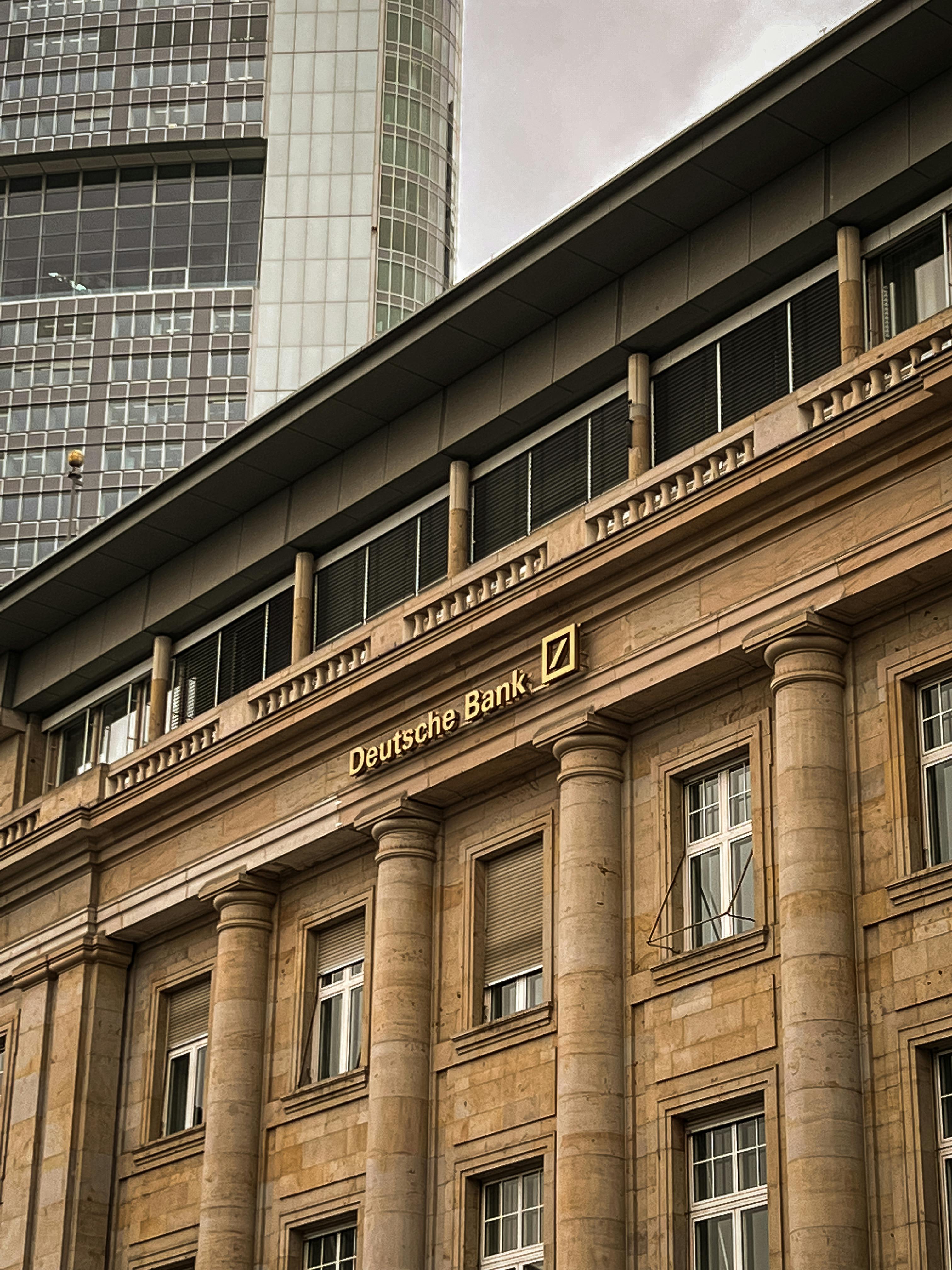 Classical building facade with columns and a clock